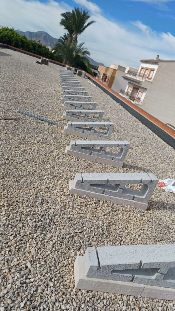 instalación de soporte de hormigón 15 grados en cubierta plana en Málaga